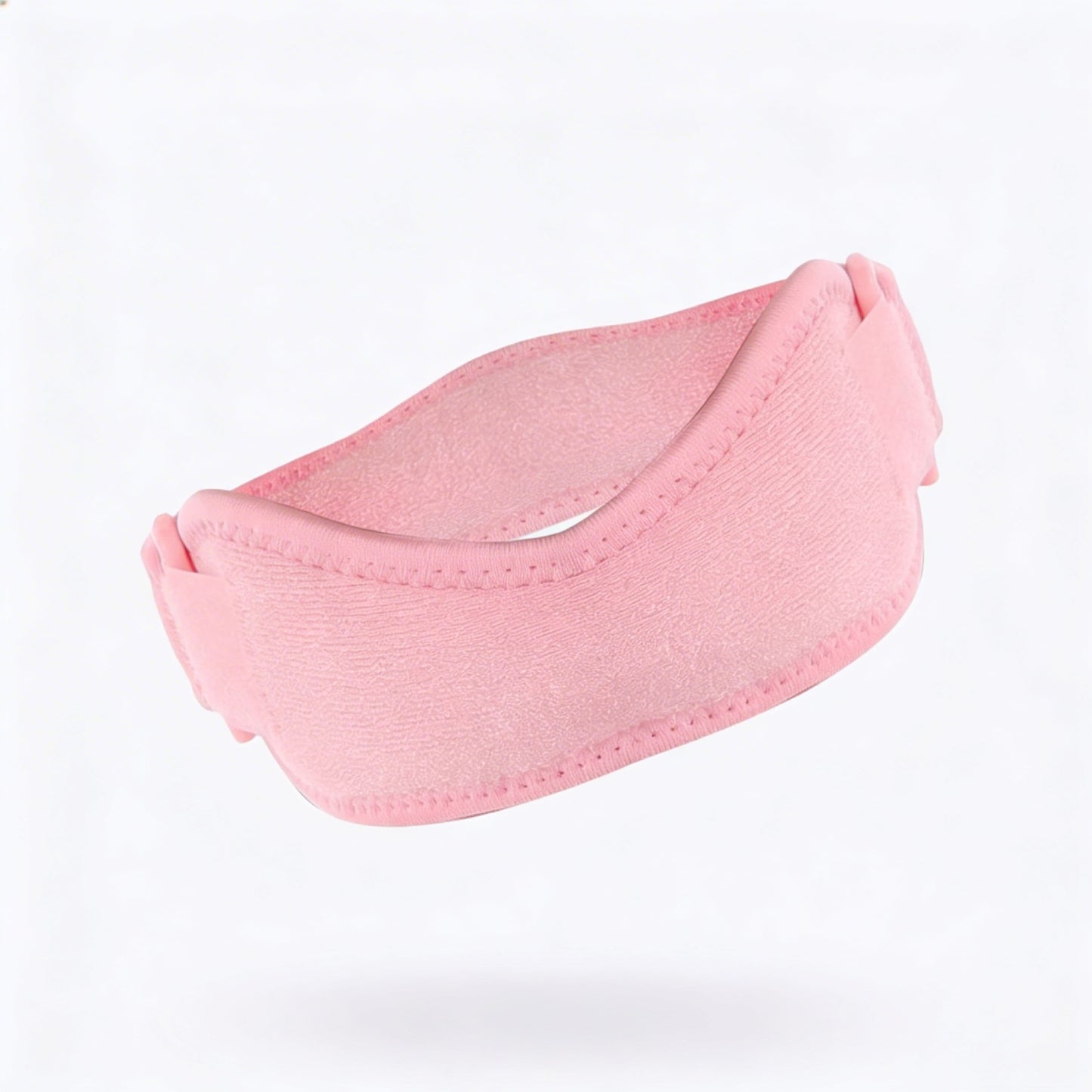 Soft knee support strap in pink with a comfortable fit, designed to provide gentle patella support during movement