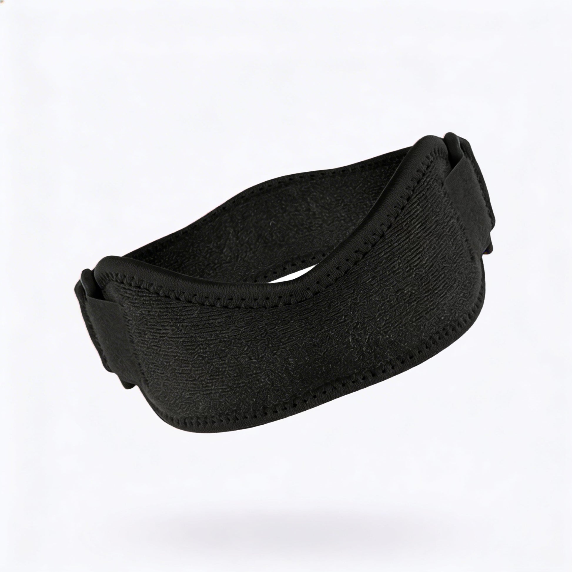 Minimalist adjustable knee strap designed for patella support, offering a secure fit and comfortable everyday use