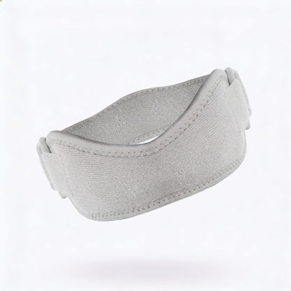 White knee strap with lightweight compression, designed for patella support and all-day comfort during activity